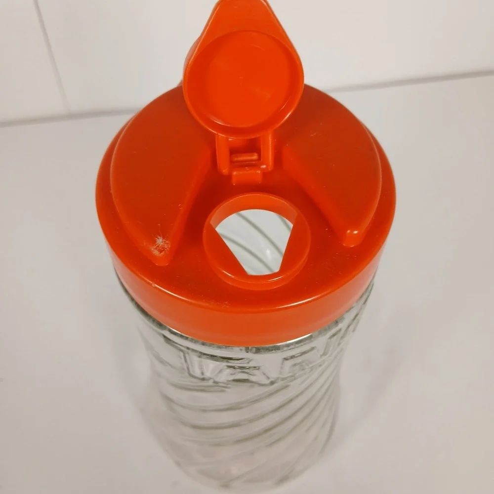 Vintage Anchor Hocking Glass Swirled Tang Pitcher with Orange Flip-Top Lid